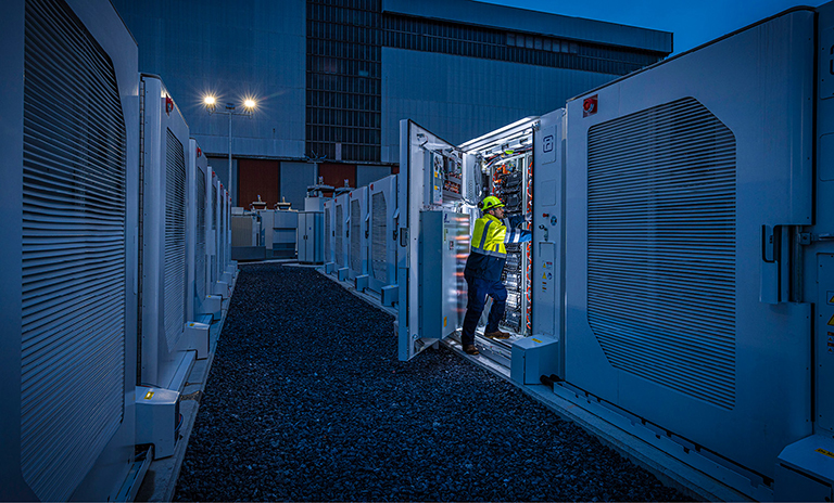 ESB employee at work in a network facility.