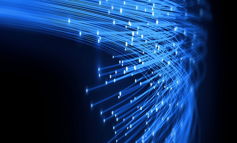 Bright blue fibre optic cables against a black background.