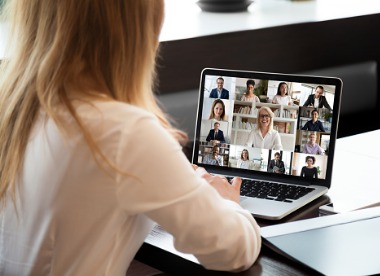 businesspeople communicating using application webcam laptop